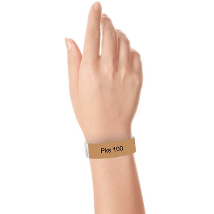a hand wearing tyvek 3/4" wristband solid mocha pks 100