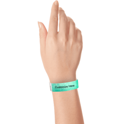 wrist wearing tyvek 3/4" solid wristband showing placeholder for customization in aqua