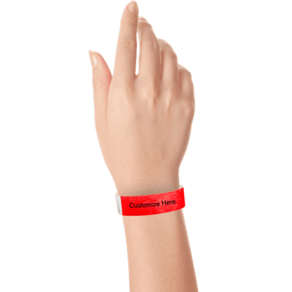 wrist wearing tyvek 3/4" solid wristband showing placeholder for customization in neon red