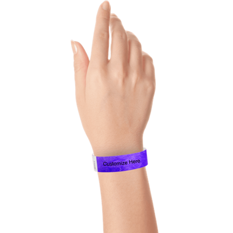 wrist wearing tyvek 3/4" solid wristband showing placeholder for customization in purple
