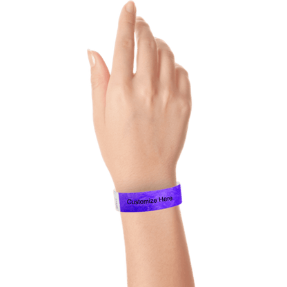wrist wearing tyvek 3/4" solid wristband showing placeholder for customization in purple
