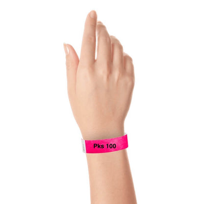 a hand wearing tyvek 3/4" solid wristband neon pink pks 100
