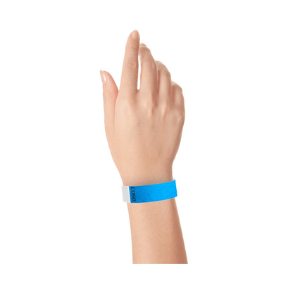 hand wearing duplicate number in neon blue tyvek 3/4" wristbands 