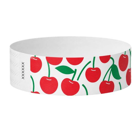 Tyvek 3/4 wristband in white and a cherry pattern in red and green printed across the band - shown in round