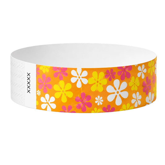 Tyvek 3/4 wristband in orange with white, yellow and pink flowers printed on the band - shown in round 