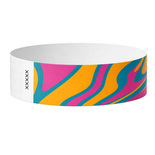 Tyvek 3/4 wristband in a tie dye striped pattern in orange, blue and pink - shown in round 