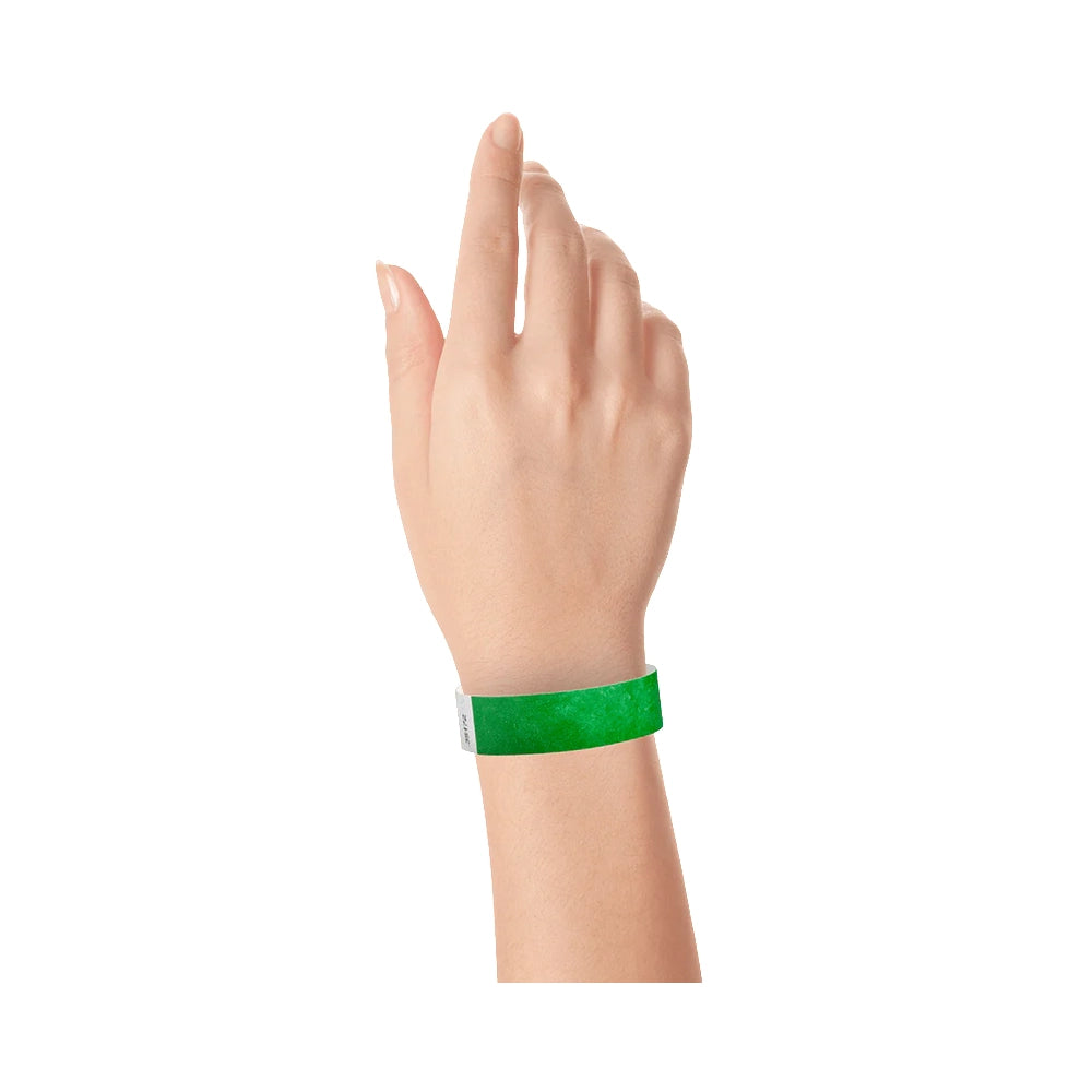 Kelly green solid tyvek wristband on wrist