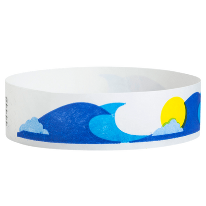 White tyvek wristband with blue wave and yellow sun design - round version shown