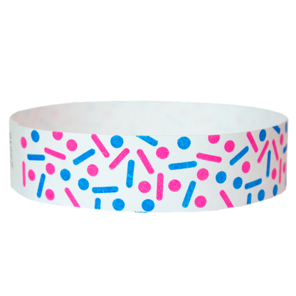 white tyvek wristband with neon pink and neon blue dots and lines - sprinkles - round version shown