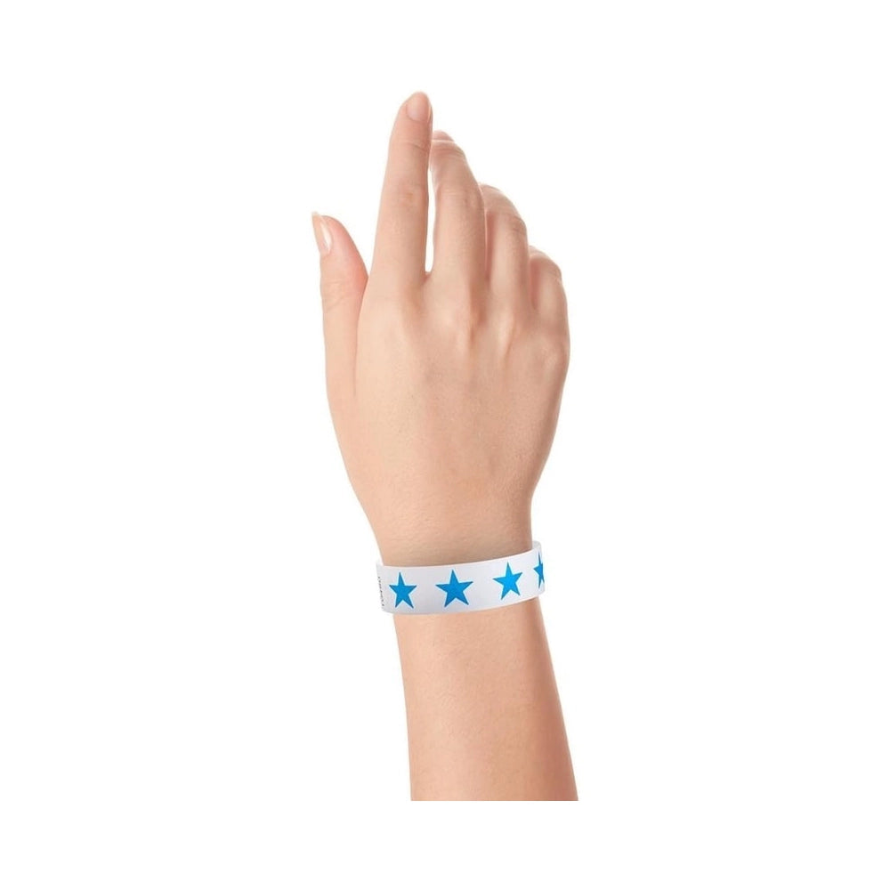 Wrist wearing White Wristband with blue stars across the band 