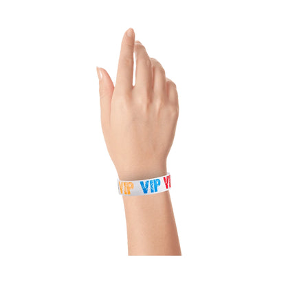 wrist wearing a white tyvek wristbands with VIP printed in neon red, neon blue and neon orange