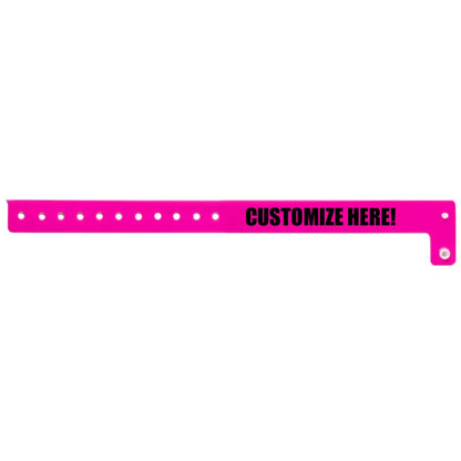 vinyl regular wristband in neon pink with black text "CUSTOMIZE HERE!" - shown in flat 
