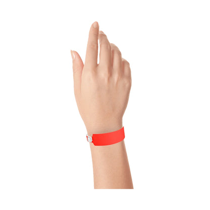 vinyl wide face wristband in neon red - shown on wrist 