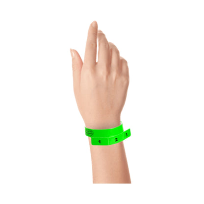 vinyl wristband with 3 tab in neon green - shown on wrist 