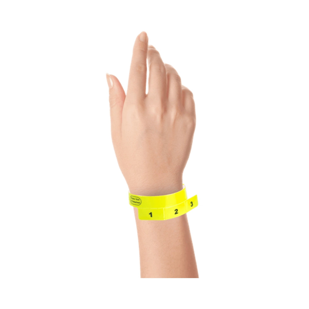 vinyl wristband with 3 tab in neon yellow - shown on wrist 