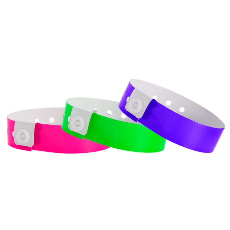 Regular vinyl wristband shown in neon pink, neon green and purple 