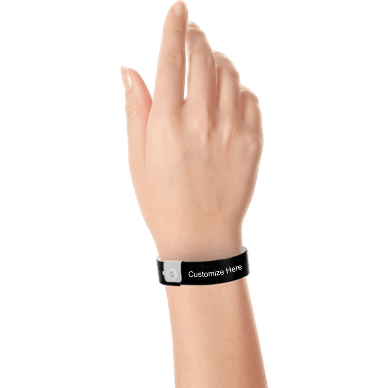hand wearing regular vinyl wristbands with a placeholder to show where you can customize the wristband in black 
