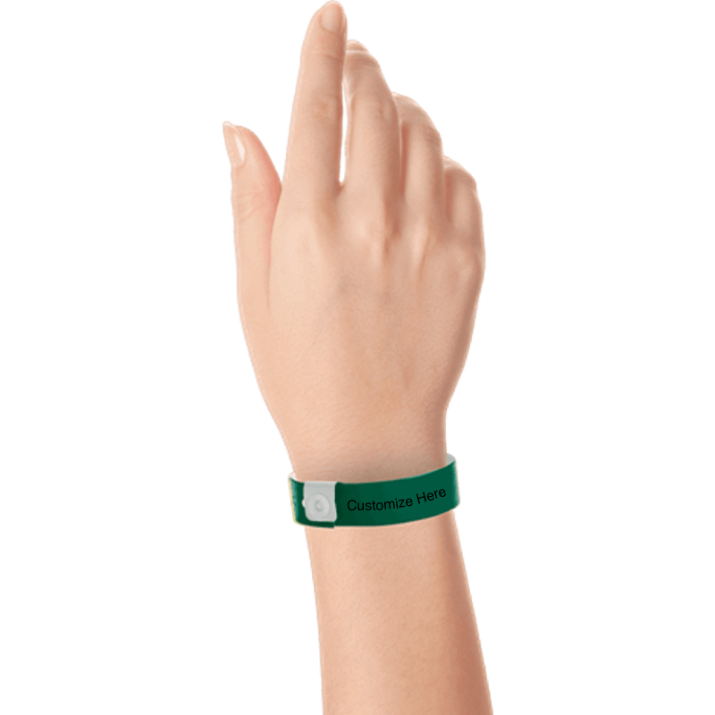 hand wearing regular vinyl wristbands with a placeholder to show where you can customize the wristband in forest green