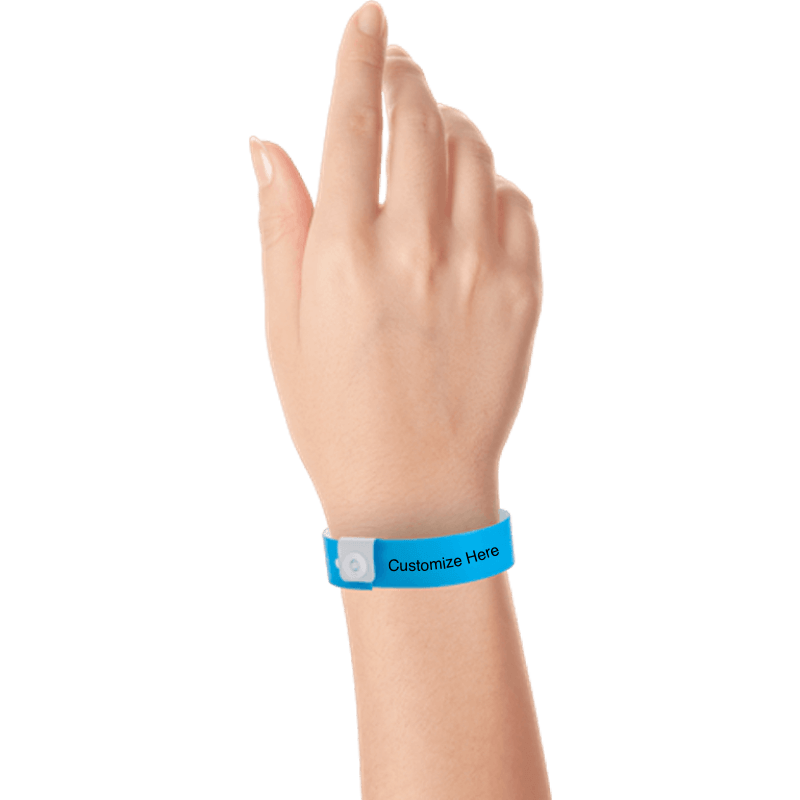 hand wearing regular vinyl wristbands with a placeholder to show where you can customize the wristband in neon blue