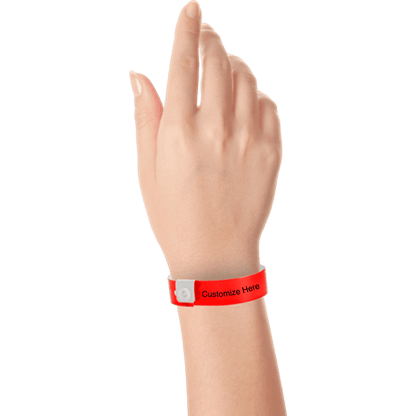 hand wearing regular vinyl wristbands with a placeholder to show where you can customize the wristband in neon red