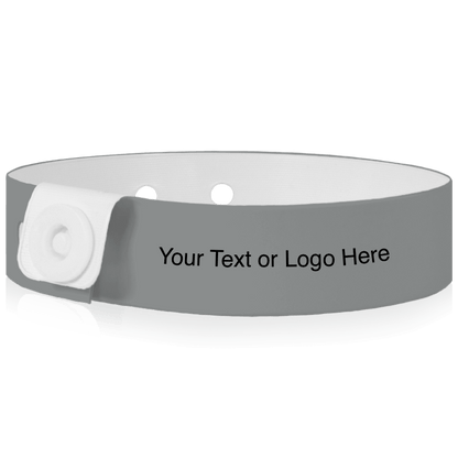 Slim vinyl wristbands with a placeholder to show where you can customize the wristband shown in silver