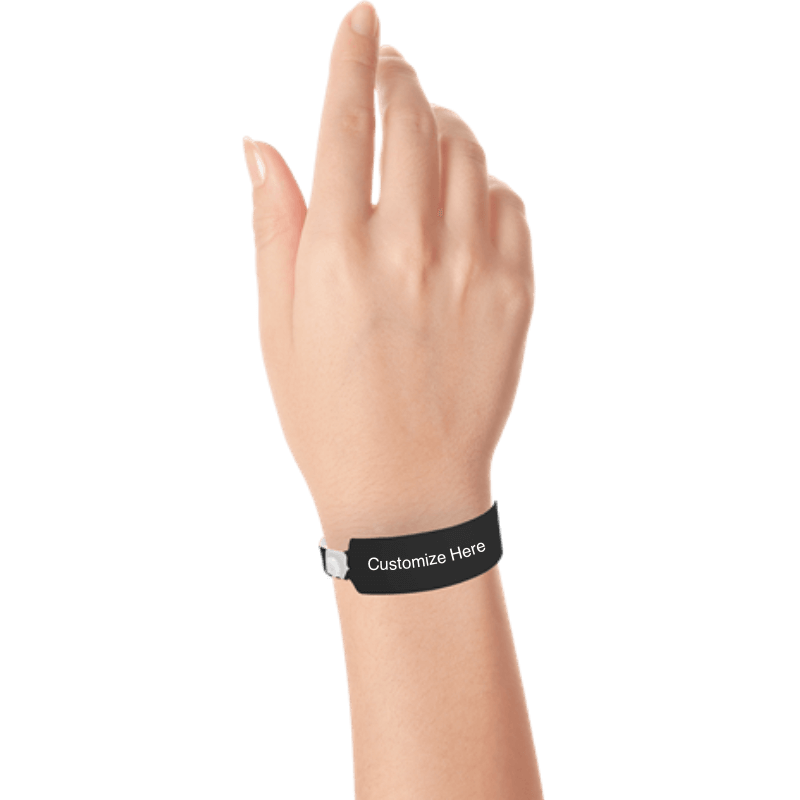 Hand wearing wide face vinyl wristbands with a placeholder to show where you can customize the wristband in black