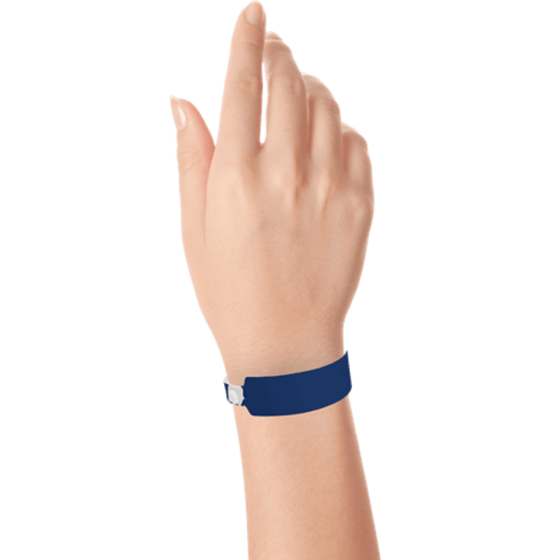 Wide face vinyl solid wristbands on hand in navy blue 