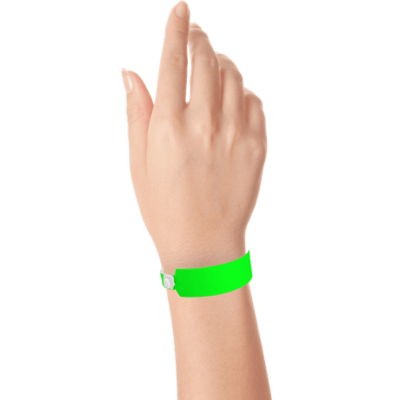 Wide face vinyl solid wristbands on hand in neon green