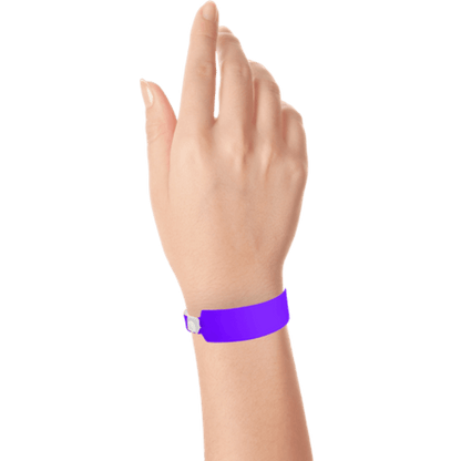 Wide face vinyl solid wristbands on hand in purple