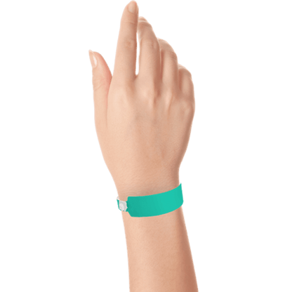 Wide face vinyl solid wristbands on hand in teal