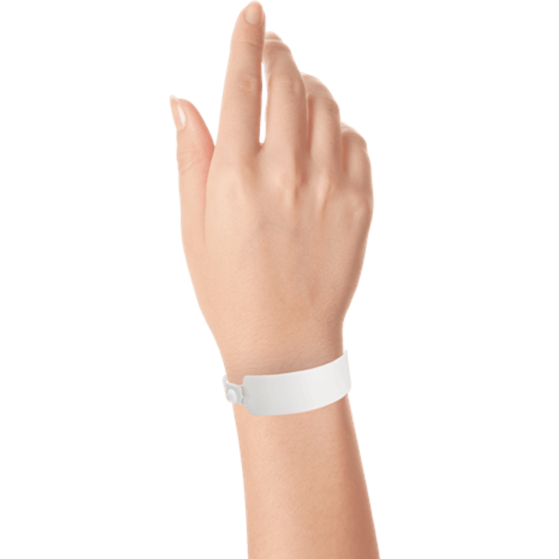 Wide face vinyl solid wristbands on hand in white 