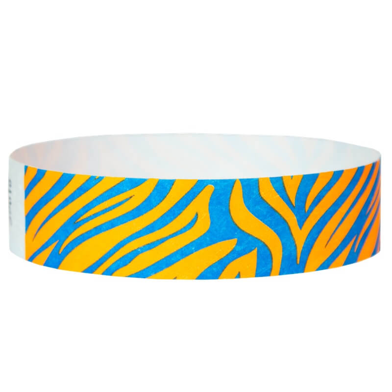 neon orange tyvek wristband with neon blue zebra pattern - round version shown