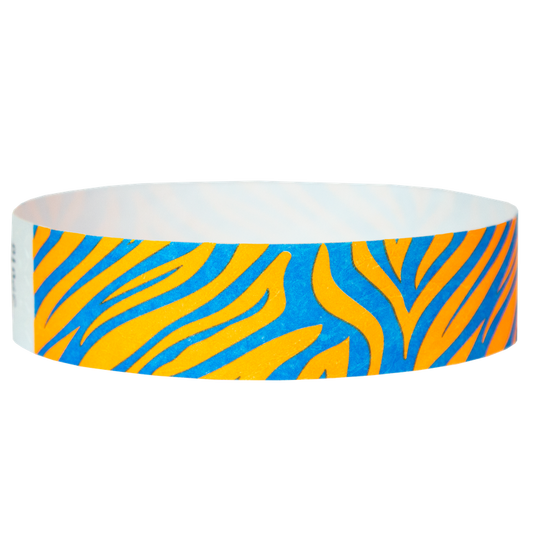 neon orange tyvek wristband with neon blue zebra pattern - round version shown