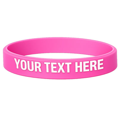 neon pink silicone wristband with white text showing where you can print your custom message