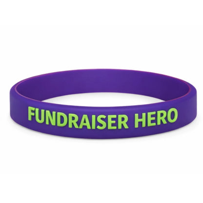 purple silicone wristbands with lime raised text
