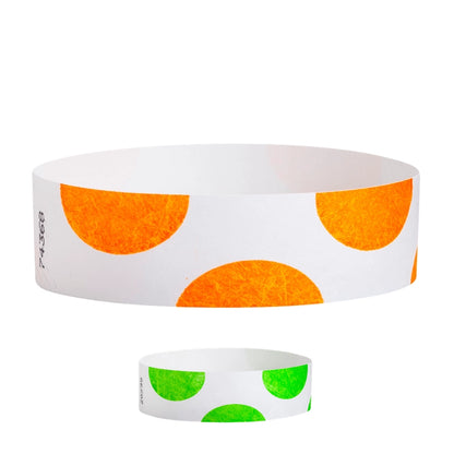 tyvek 3/4" white wristbands with half circle pattern in neon orange, and neon green