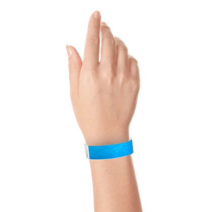 hand wearing a  3/4" tyvek wristband solid neon blue