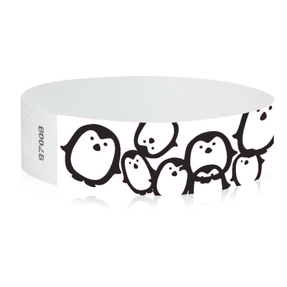 white Tyvek Wristband with black penguins - round version shown