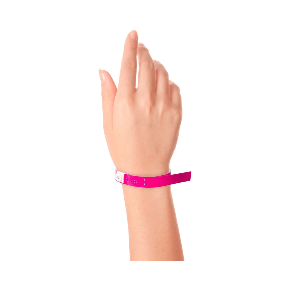 Plastic slim wristband in neon pink - shown on wrist