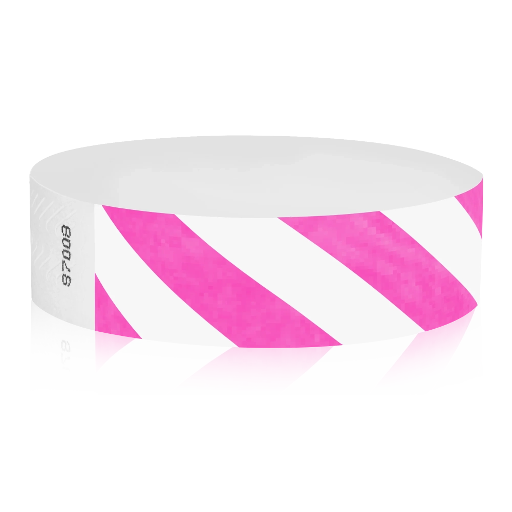 White tyvek wristband with neon pink diagonal stripes - round version shown