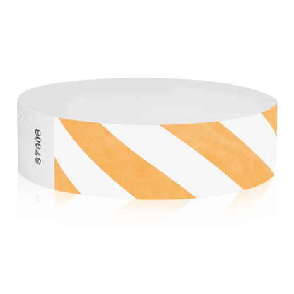 White tyvek wristband with neon orange diagonal stripes - round version shown