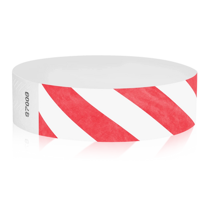 White tyvek wristband with neon red diagonal stripes - round version shown